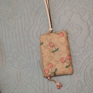 Adorable coach cherry wristlet!